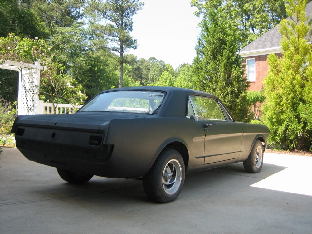 1965 Mustang 289 V8 Ford Coupe. A primer black 1965 ford mustang. Drage race mustang in black primer. Classic car restoration a 1965 Ford Mustang coupe.