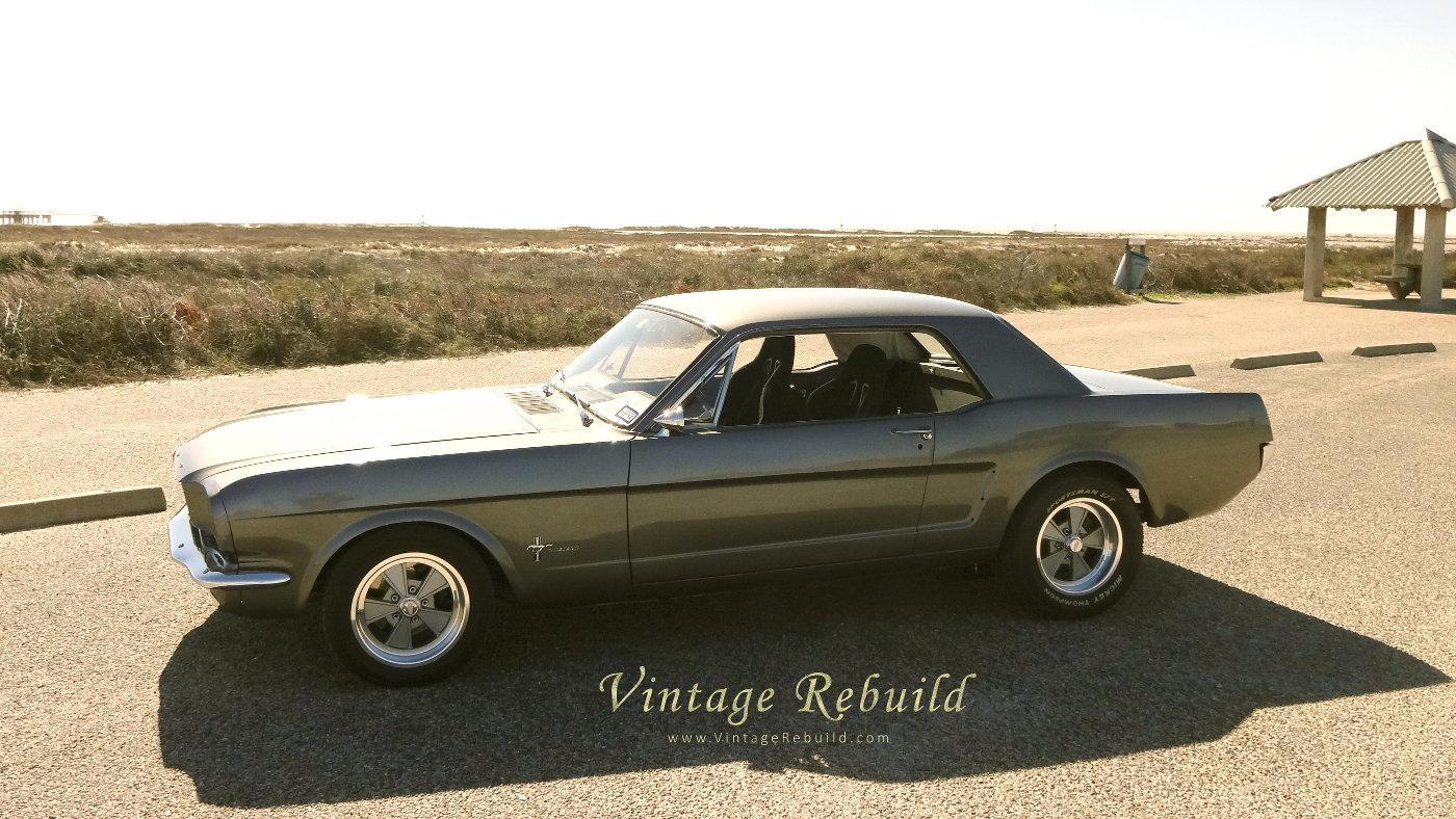 1965 Mustang 289 V8 Ford Coupe Picture Beach. A Gray 1965 Ford Mustang by the beach. This 1965 Mustang has a 289 Ford V8. A race inspired 1965 mustang, a classic american car.